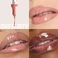 Блеск для губ HUDA BEAUTY Faux Filler Shiny Non-Sticky Lip Gloss Цвет: She Flirty - rosy, pink gloss Size 0.13 oz / 3.9 mL - Фото 3